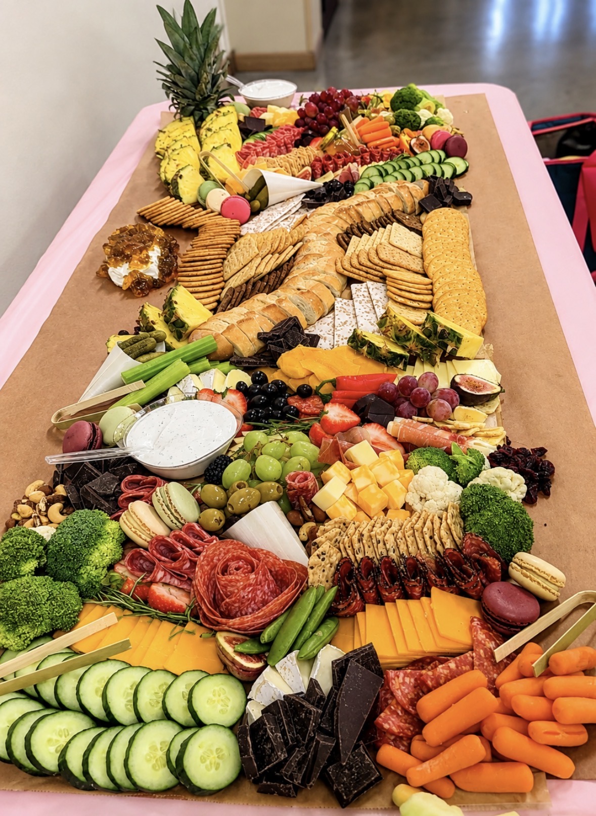 Large charcuterie box with macarons and salami roses